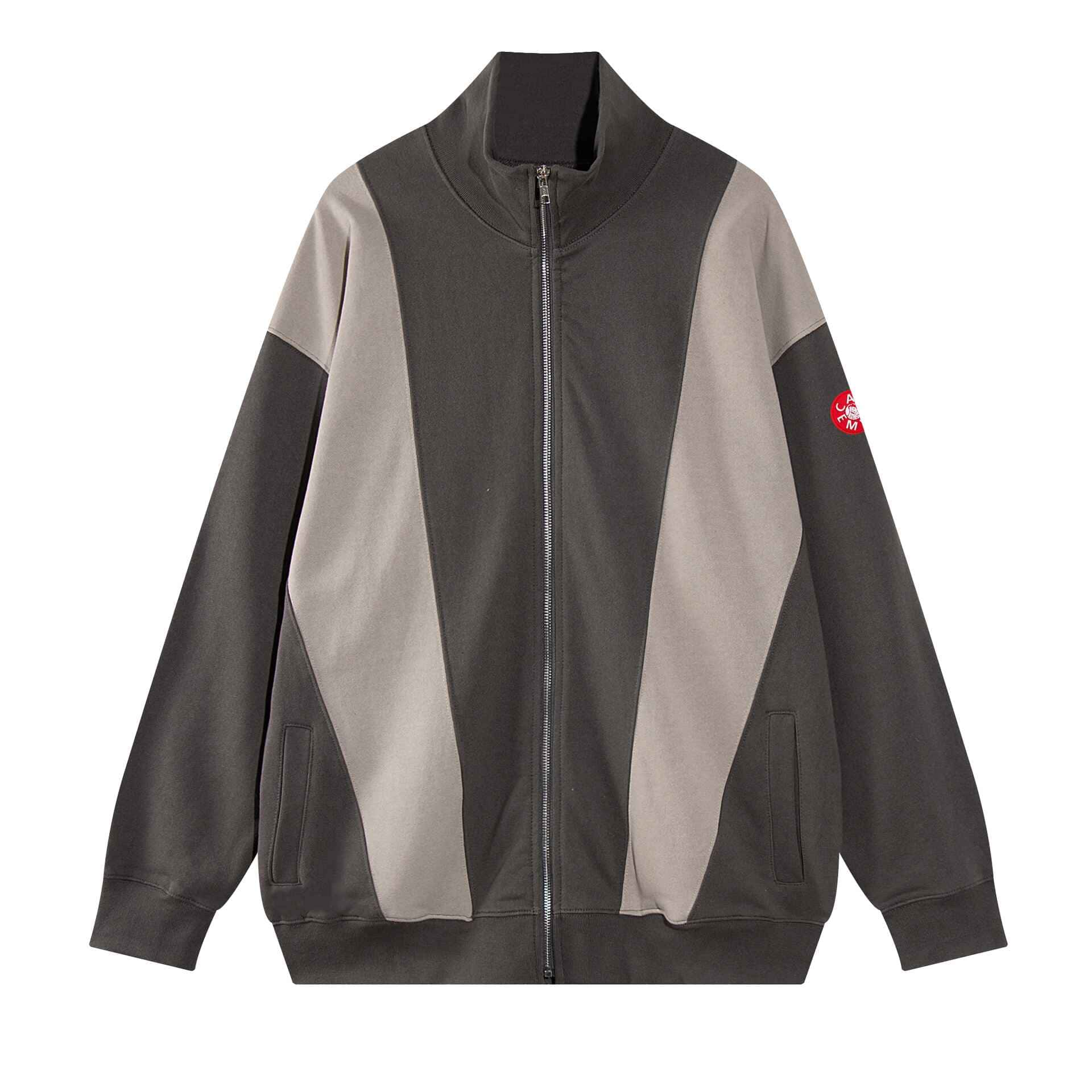 Oversized color-block zip-up jacket with sporty design and logo patch, available in neutral tones for casual wear.