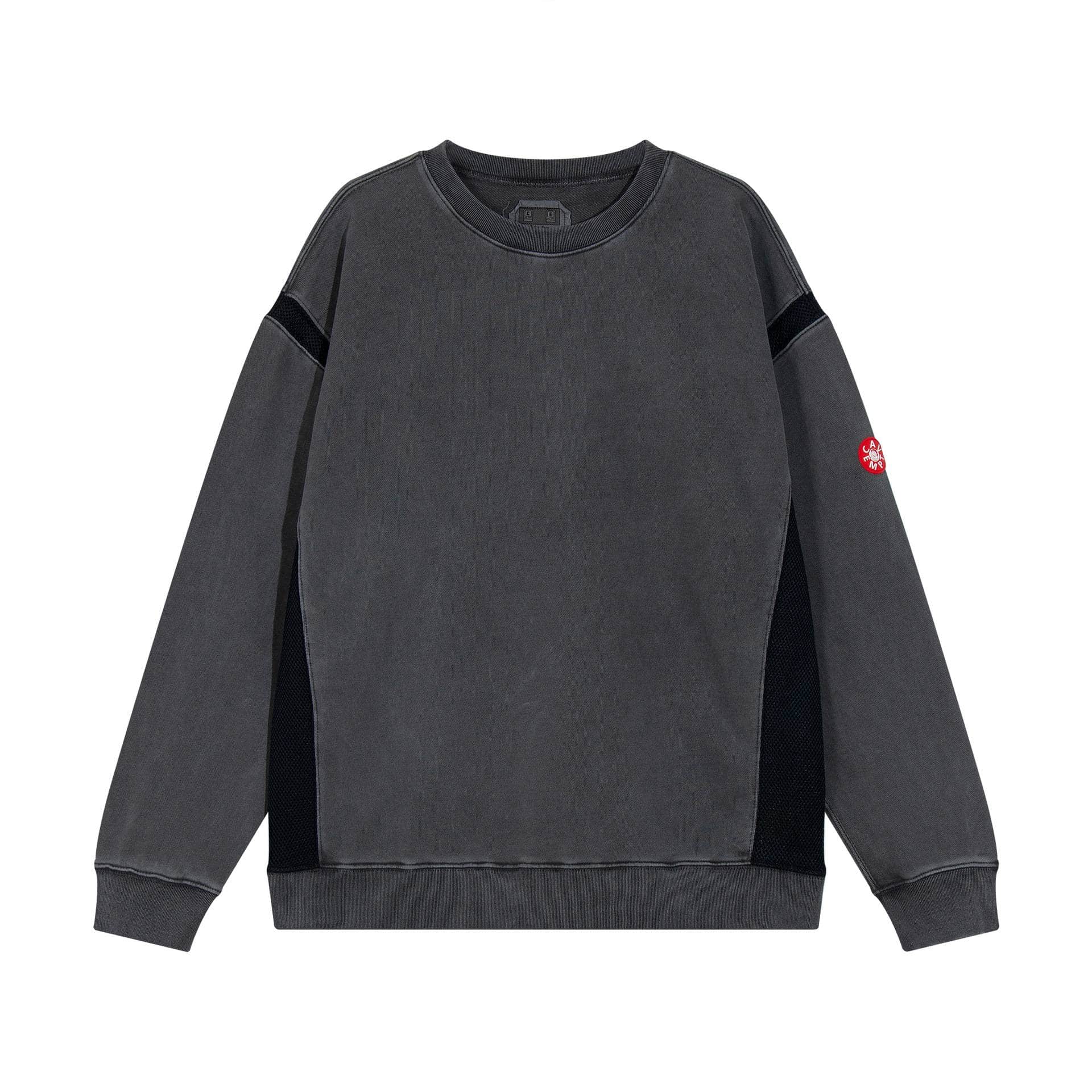 Retro-inspired dark grey sweatshirt with black mesh accents and a red logo patch on the sleeve, perfect for casual winter wear.