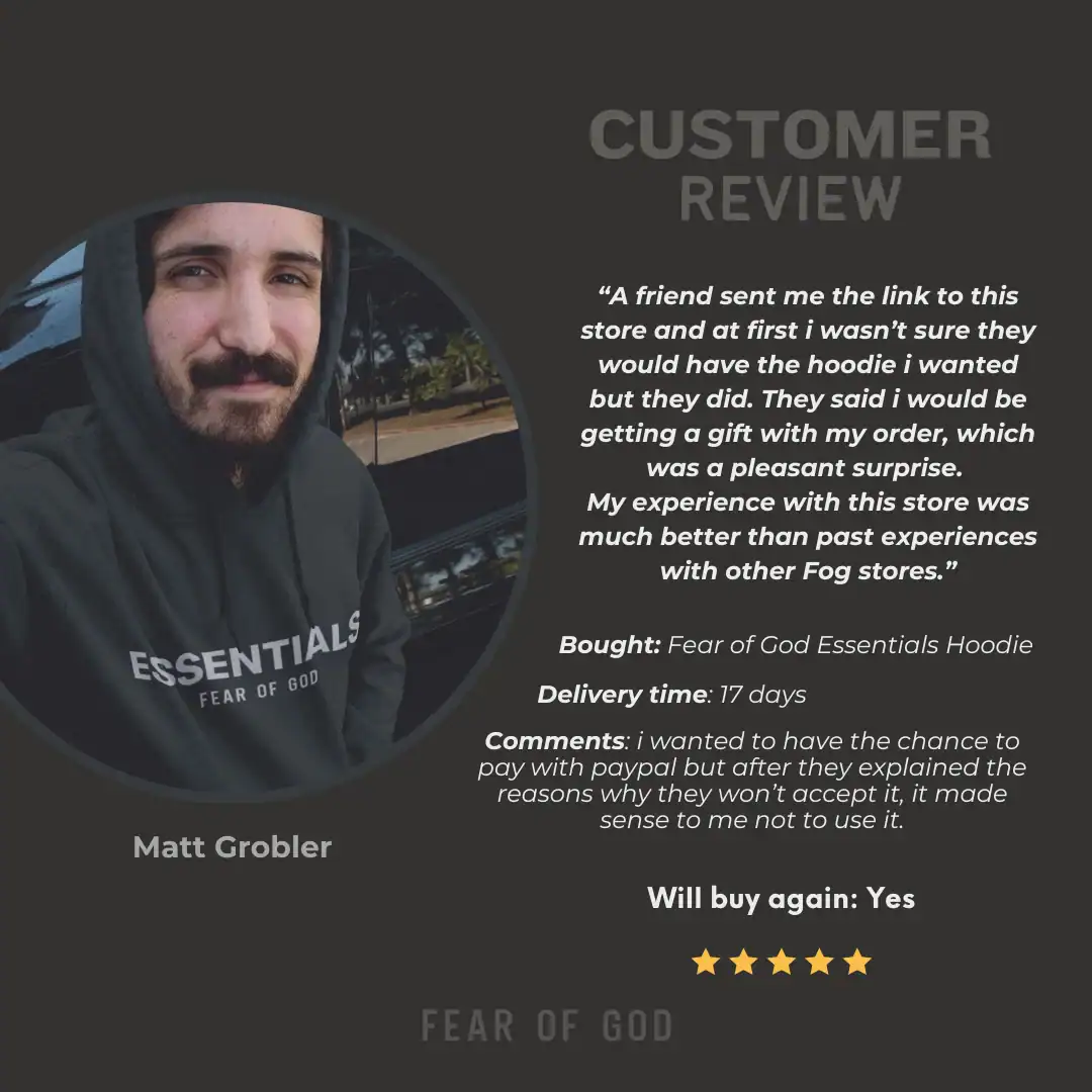 Hoodie with logo "ESSENTIALS FEAR OF GOD" on the front, worn by a smiling man with a beard and mustache; casual winter apparel, black color, comfortable fit.
