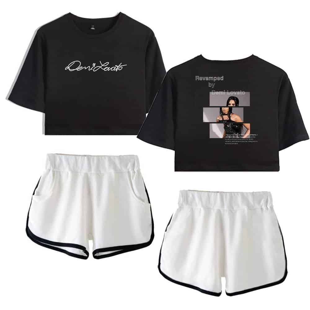 Black crop top with white script "Demi Lovato" logo, white athletic shorts with black trim, trendy and affordable fitness apparel, latest casual sporty outfits for women, perfect for stylish activewear on a budget.