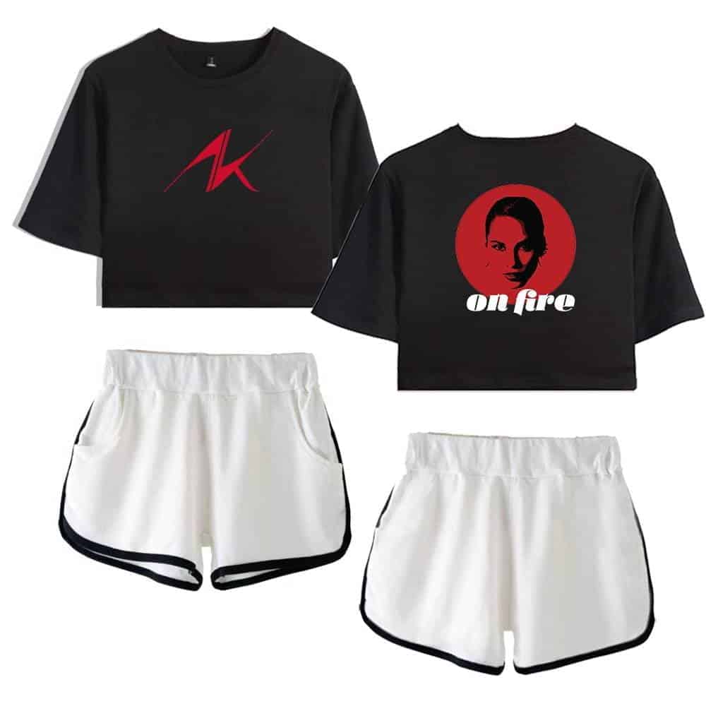 Black cropped t-shirts with graphic prints, paired with white athletic shorts with black trim for sporty casual outfits.
