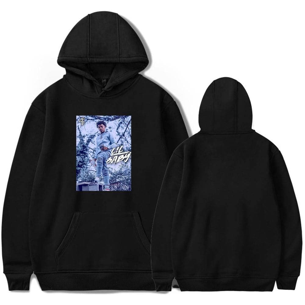 Youthful black hoodie with a trendy graphic print of a young man in a natural outdoor setting, perfect for casual wear. Features a front pocket and adjustable hood for comfort and style.