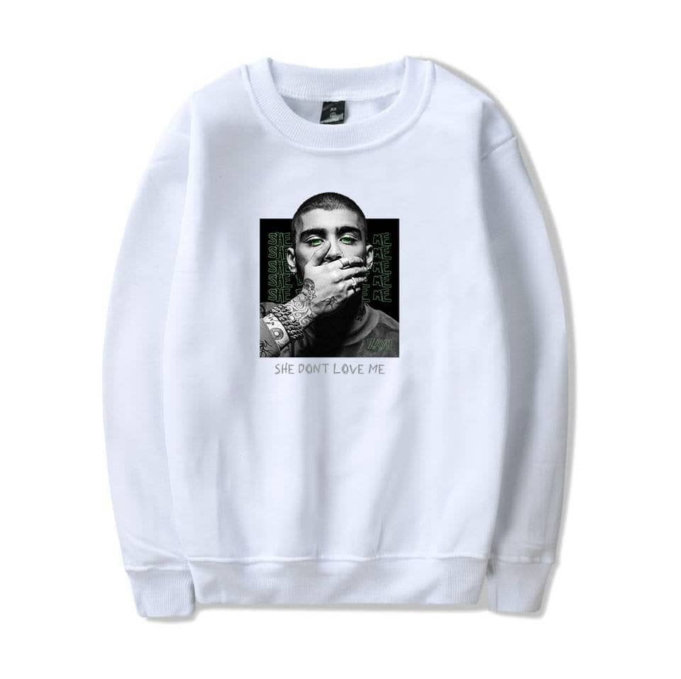 Latest cheap apparel sweatshirt with graphic print of a person covering their mouth, featuring the text "SHE DON'T LOVE ME" beneath the image, casual streetwear style.