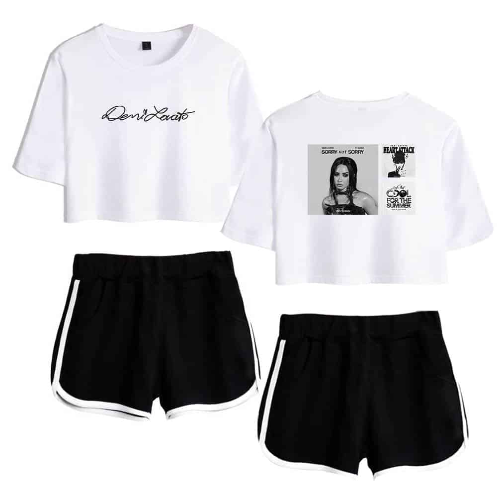 Comfortable white crop top with graphic designs and black athletic shorts with white stripes, latest trendy affordable apparel set for casual wear, perfect for summer and sports activities.