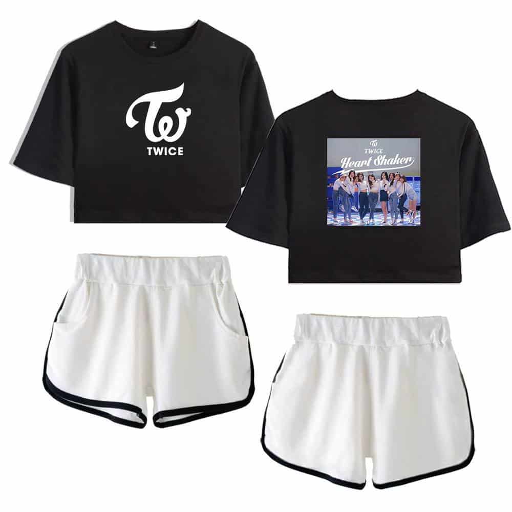 Twice black crop top with white logo and group photo on back, white athletic shorts with black trim, latest cheap apparel.